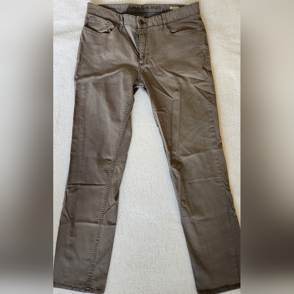 Men's Calvin Klein grey jeans. Size 33 slim straight